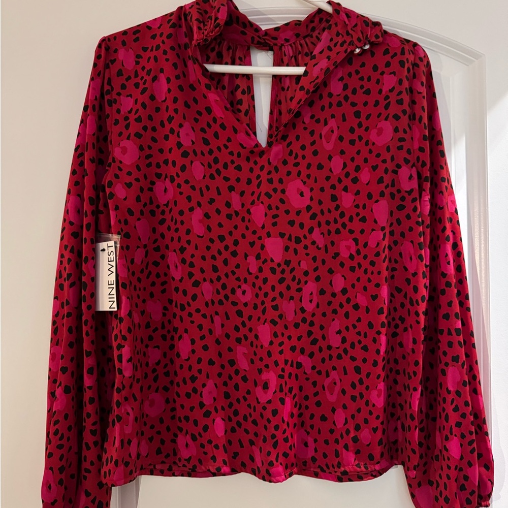 Red silk blouse
